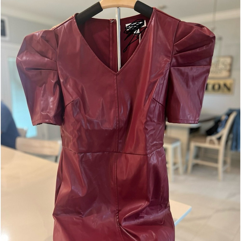 New with tags faux leather lined dress. Maroon in color. Sz small
